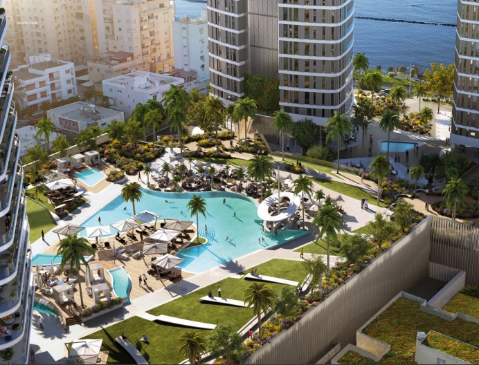 resort complex with sky view of luxurious swimming pool and palm trees