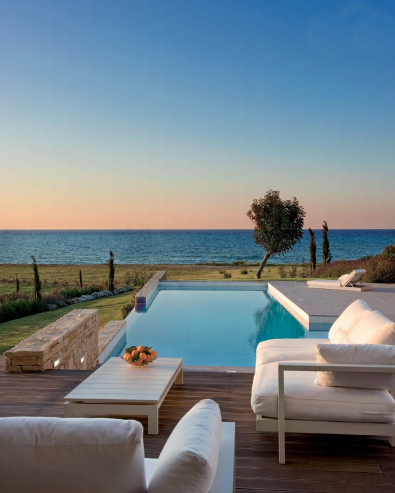 pool deck of elegant villa in afternoon