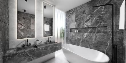 high-end bathroom of modern property with grey marble 