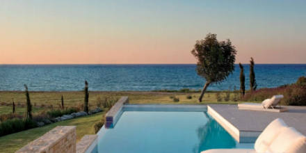 pool deck of elegant villa in afternoon